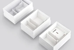 COMPONENTS & ASSEMBLY. The ‘slide-out’ packages are primarily assembled on line with some semi-automatic and manual work. Each of the packaging components is designed for easy opening, while maintaining product security. (Photo courtesy of Swedbrand)