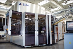 REDESIGNED OVENS. The new 16-station blow-molding machine uses fewer oven modules and fewer lamps per module to decrease oven power consumption by more than 45%.