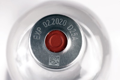 VIAL CAP. Shown here is a laser code marked onto a vial cap.