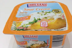 Thermoform/fill/seal system also applies an in-mold label.