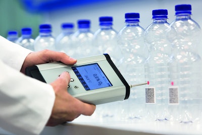 Oxygen ingress measurement in PET bottles: A sensor spot (type PSt6, PreSens GmbH) is attached to the inside wall of the bottle and read out from the outside with a fiber optic oxygen meter (Fibox 4 trace, PreSens GmbH) – without direct contact leaving the bottle intact.