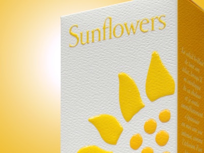 This carton for Elizabeth Arden’s Sunflowers fragrance uses multiple printing techniques.