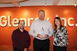 Glenroy accepts award
