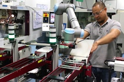 A Universal Robot operates within a mini work cell at Tegra Medical.