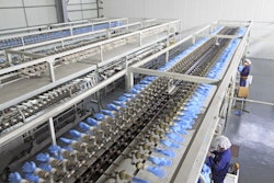 This PVC glove production line is an example of plastics processing machinery.