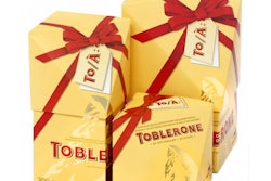 The triangular carton facings stand out conspicuously on store shelves, vigorously inviting consumer attention.