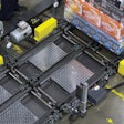 The low-level drag chain conveyor lets Frank Beer load and unload three pallets at a time.