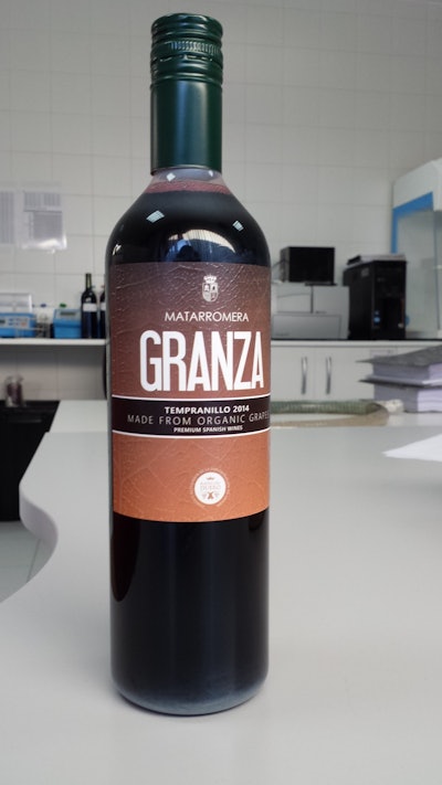 A 750-mL wine bottle that is injection stretch blow molded of PLA.