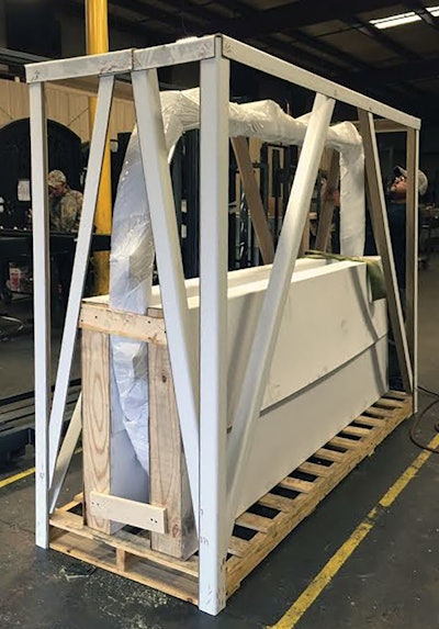 Each door is wrapped securely in laminated paperboard and then surrounded by a protective “rib-cage” frame.