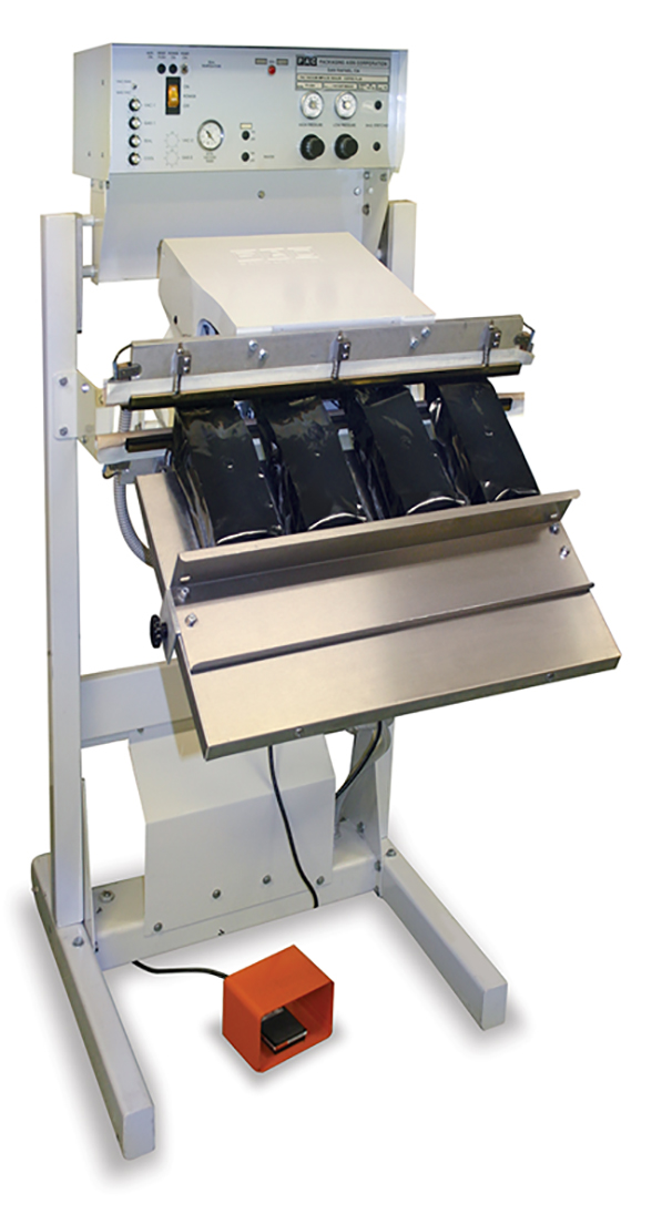 Vacuum sealer flushes bags with nitrogen or any other suitable gas used to preserve coffee freshness.