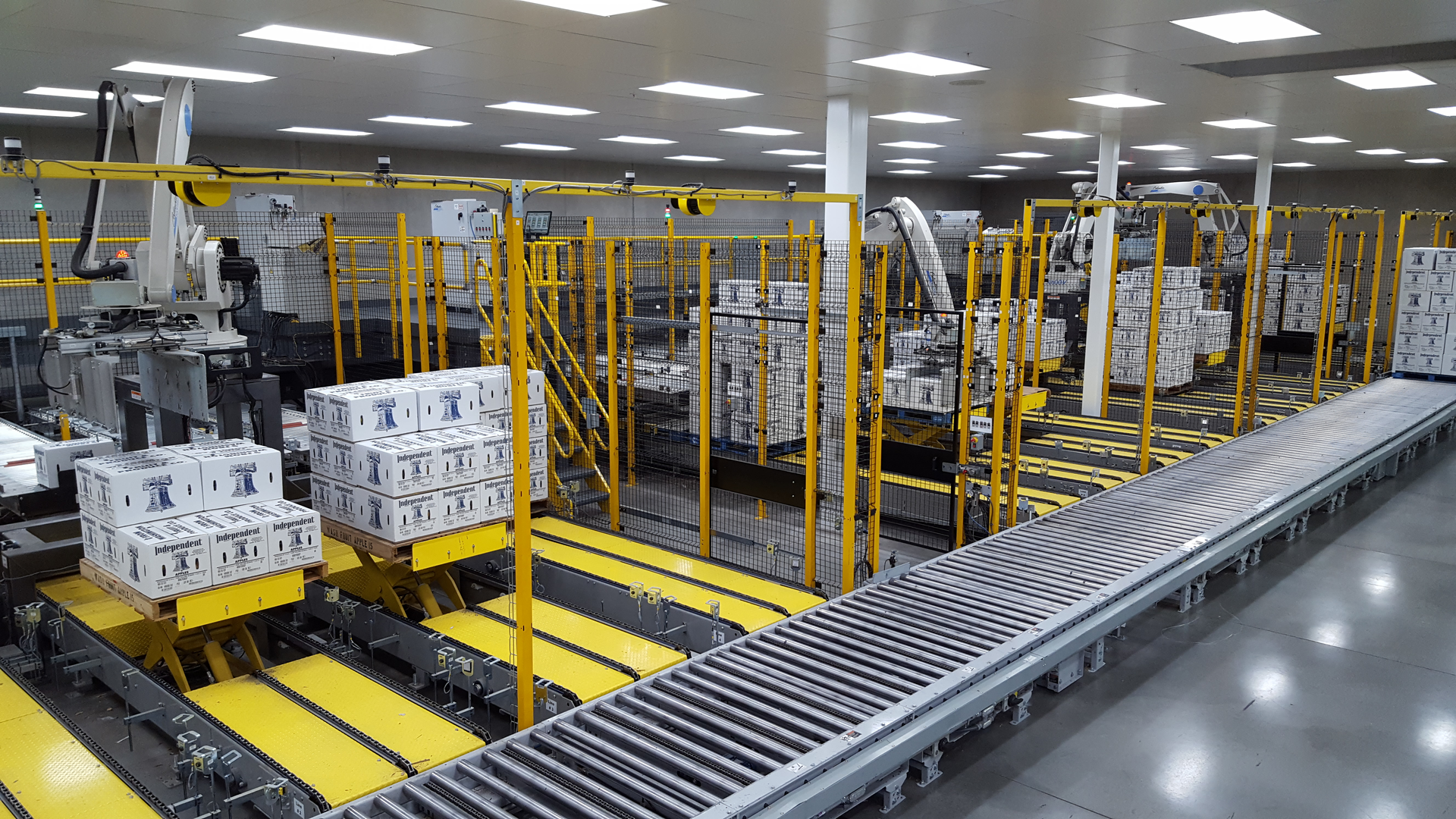 Washington Fruit’s North plant has five robotic palletizing cells, each with four lanes.
