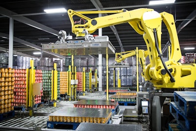 Mackle’s secondary packaging line begins with six pallet infeeds leading to two robotic depalletizing cells.