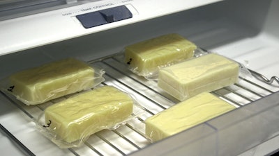 Researchers tested their milk-protein film as a packaging for blocks of cheese. Photo supplied by the American Chemical Society.