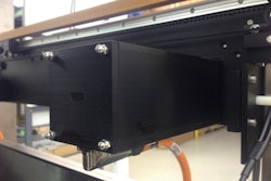 Innovative use of servo motors (shown) has brought automatic adjustment of mechanical axes of motion to the vf/f/s machine.