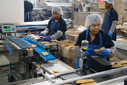 The combination weigher gently conveys and precisely weighs frozen seafood items.