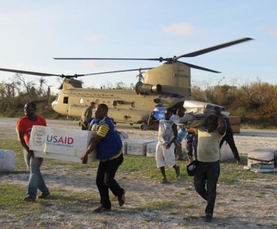 USAID/OFDA and the Dept. of Defense provide humanitarian logistics and transportation to ensure rapid delivery of relief commodities to populations in hard-to-reach areas. Photo from USAID press release.