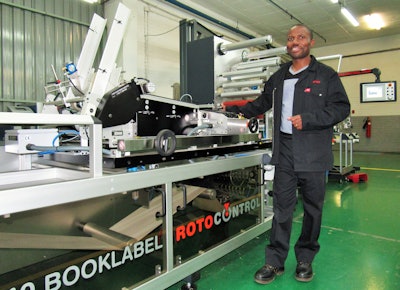 Peter Sithole by Rotolabel booklet machine.