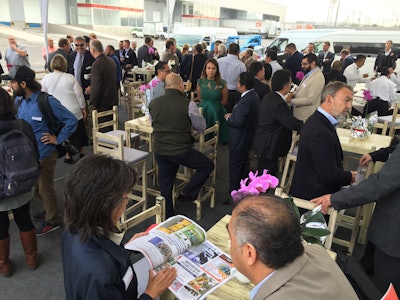 A crowd of CSi customers and press gathers in advance of the ribbon cutting.