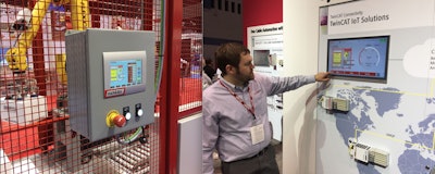 Beckhoff Automation’s Shane Novacek demonstrates the data being pushed down from the cloud, gathered from a machine in Flexicell’s booth elsewhere on the trade show floor.