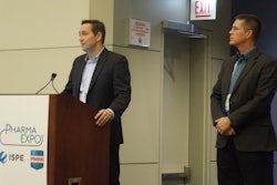Optel Vision's Mario Simard (at podium) and Steve Peterson co-presented 'Serialization-Regulatory Compliance' on Tuesday, Nov. 8