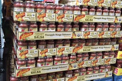 The filled PET jars are placed in corrugated trays, shrink-wrapped and palletized for shipment.