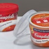 When consumers made it clear that they wanted to be able to see the product inside the microwaveable container, Campbell replace