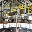 A high-level depalletizer single files and feeds bottles into a lowerator on their way down the line. Many of the equipment suppliers represented in the line are located near the brewery’s Richmond, VA, location.