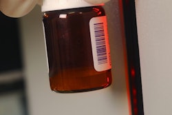 Shown here is a TEKLYNX vial scanner in use.