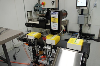 Serialized cartons are shown here as they output from the Nutec carton conveyor.