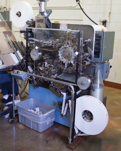 Tens of thousands of tea bags are produced annually on three vintage semi-automatic bagging machines like this one.