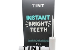 TINT is packaged in a lipgloss-style pack that lets users brush the whitener onto their teeth.