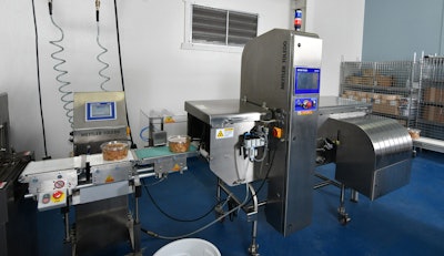 La Provence installed its latest X-ray machine, a Safeline X33, to inspect 5- to 16-oz tubs of cookies.