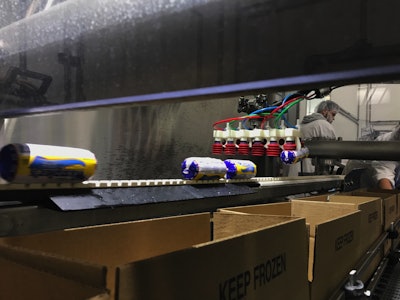 The three-axis Delta robot picks up each chub individually with its vacuum grippers, until there are six chubs on the EOAT.