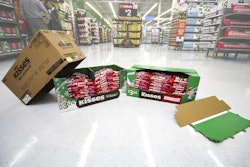 Hershey has changed its display-ready case from a two-piece design (l.) to a one-piece box (r.).