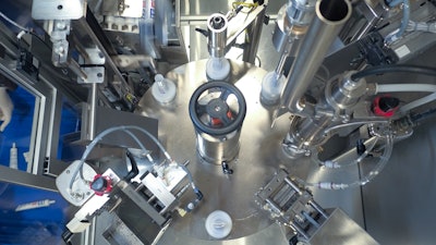 The new servo-driven filler/sealer (pictured from above) accommodates tubes from 0.2 to 14 oz.