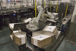 The ROBOX case erector with two six-axis ABB robots can pick randomly from six case magazines.