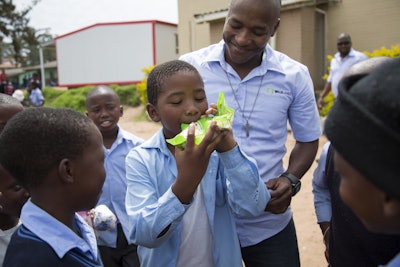 Once schoolchildren had eaten their FUTURELIFE Smart food meals, they helped collect the pouches.