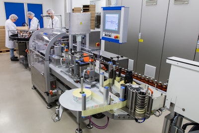 Produlab Pharma can now run various-sized bottles faster and with less complexity since installing its new labeler on this production/packaging line.
