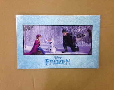 A shrink-wrapped Disney Frozen movie package.