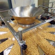14 head CombiScale multi-head weigher accurately weighs and dispenses pet treats.