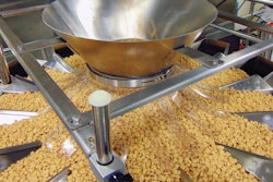 14 head CombiScale multi-head weigher accurately weighs and dispenses pet treats.