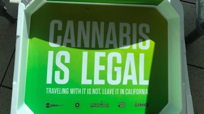 As the LA Times reports, Ontario airport security trays have a public service announcement from cannabis manufacturer Organa Brands. Starting Jan. 1, the recreational use of marijuana by those 21 and older will be legal in California. (Robin Abcarian / Los Angeles Times)