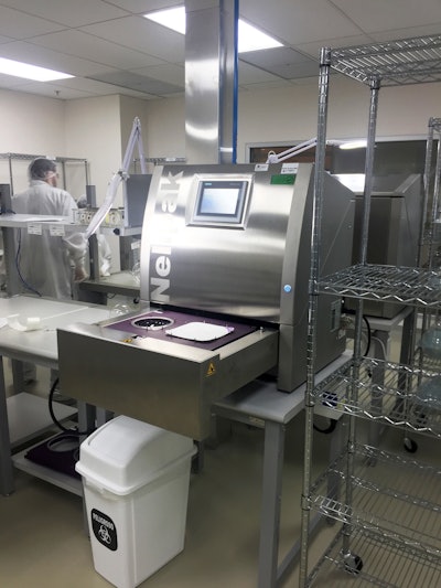 Establishment Labs seals trays of breast implants on a Nelipak Healthcare Packaging NX-T1 machine.
