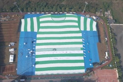 The T-shirt measures approximately 320 feet high by 230 feet wide and is made from 200,000 recycled PET bottles.