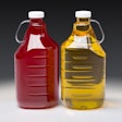 New 2-L SureHandle bottle on the right, filled with edible oil. Original 64-oz on the left.