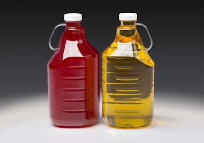 New 2-L SureHandle bottle on the right, filled with edible oil. Original 64-oz on the left.