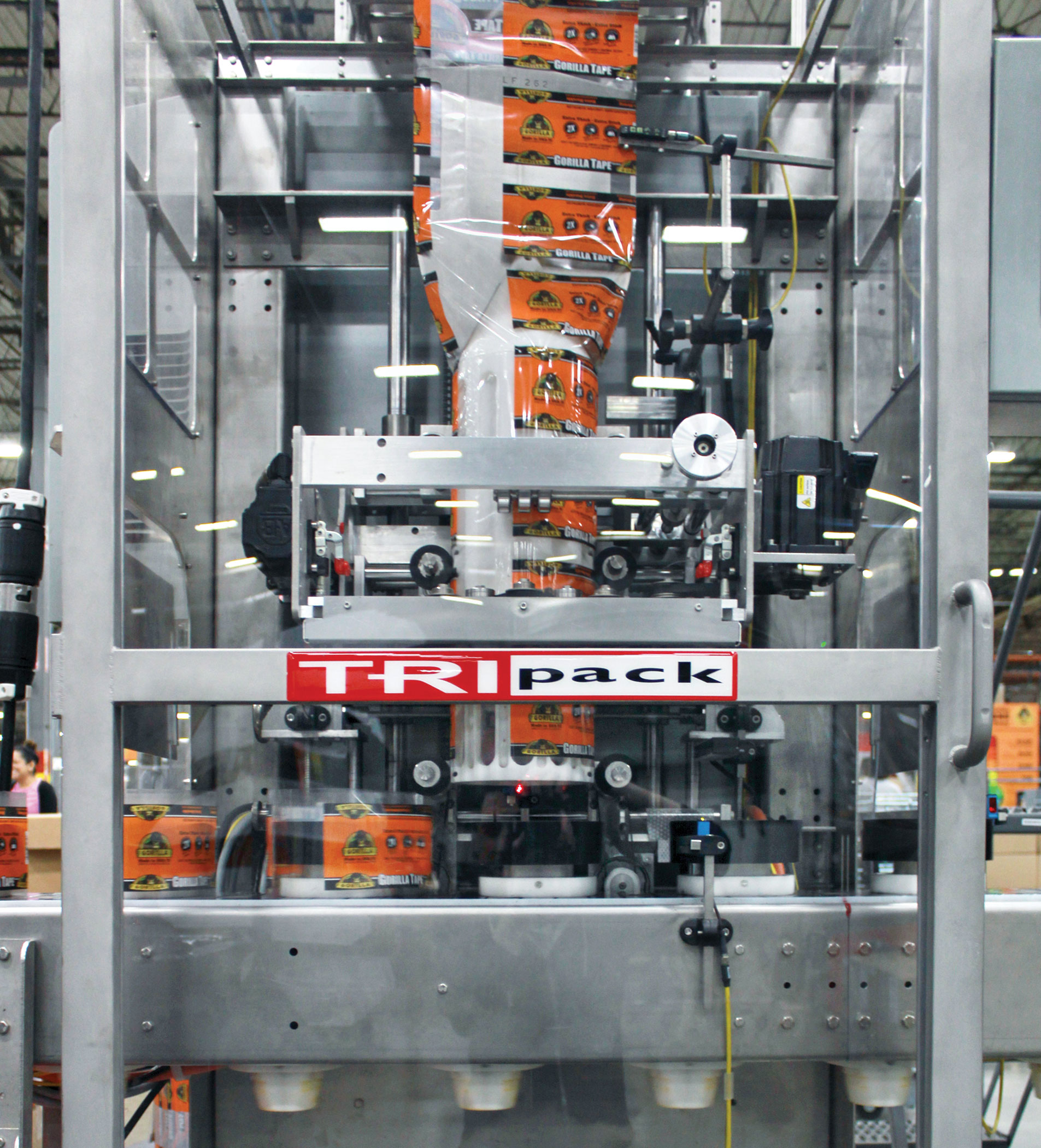 The continuous sleeve is metered, then cut to length on the fly, at a standard running rate of 80/min.