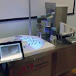 The Smart Table is backlit to take advantage of a smart vision system that takes chromatic shift into account for precision robo