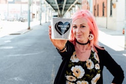 The first in a rotating series of designs features artist Amberella’s ‘Goth Heart,’ with the message, ‘YOU GOT THIS.’