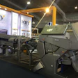 Key Technology demos its VERYX digital sorter and inspector, which is fed by Iso-Flo vibratory conveyors.
